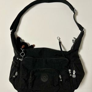 Kipling Erica Purse, black zippers, 9" hight, 11" x 6" base, adjustable strap